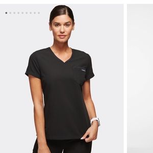 Jaanuu small Vital 2-Pocket Tuck-In Top